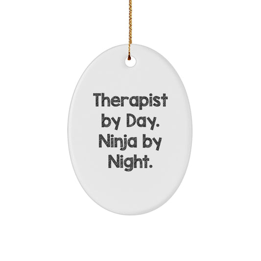 Therapist Gifts from Friends - 'Therapist By Day. Ninja By Night.' Oval Ornament, 3.25'' Tall, White, Christmas - Image 1