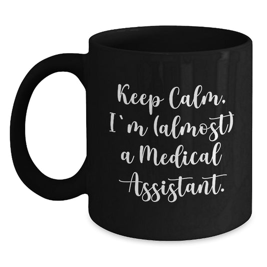 Funny Medical Assistant Birthday Unique Gifts from Friends and Family - Gifts for Medical Assistant Men and Women - Keep Calm I'm almost A Medical Assistant Black Coffee Mug - Main