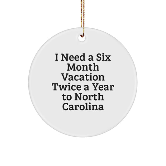Funny North Carolina Gifts from Men, Women, Friends, or Family for North Carolina Enthusiasts, 'I Need A Six Month Vacation Twice A Year To North Carolina' Christmas Unique Circle Ornament - Image 1