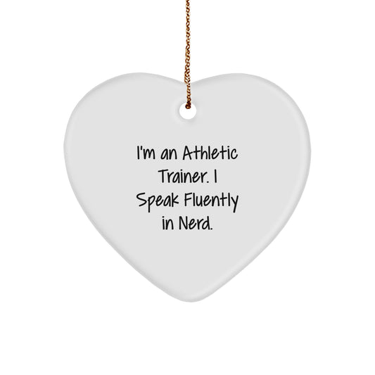 Funny Athletic Trainer Gifts from Friends for Christmas - I'm An Athletic Trainer. I Speak Fluently In genius. Heart Ornament - Image 1
