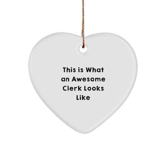 Funny Clerk Gifts from Friends for Awesome Clerks - Heart Ornament with 'This Is What An Awesome Clerk Looks Like' Quote, White, 2.75'' Tall - Christmas Unique Gifts - Image 1