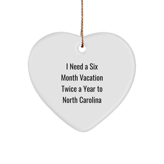 North Carolina Heart Ornament Gifts from Friends, Funny Quote, Christmas Unique Gifts for North Carolina Residents, 'I Need A Six Month Vacation Twice A Year To North Carolina' Heart Shaped Ornament - Image 1