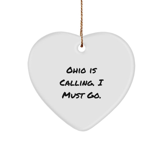 Funny Ohio Gifts, Heart Ornament for Friends, 'Ohio Is Calling. I Must Go.' Quote, White Heart Shaped Ornament for Women, Gift for Ohio Residents, Christmas Unique Gifts from Friends - Image 1