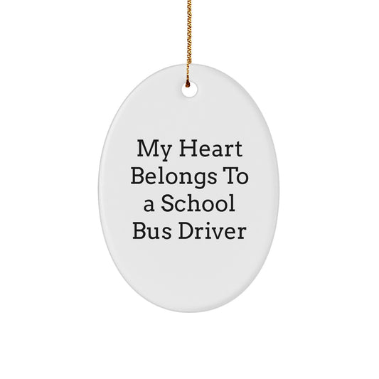Funny School Bus Driver Gifts, My Heart Belongs To A School Bus Driver Oval Ornament, Unique Christmas Unique Gifts from Friends for School Bus Driver, 3.25 Tall Durable MDF Oval Ornament - Image 1