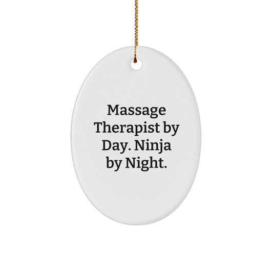 Massage Therapist Gifts from Friends for Christmas - Oval Ornament with 'Massage Therapist By Day. Ninja By Night.' Quote - Image 1