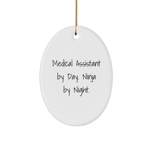 Medical Assistant Gifts from Friends to Medical Assistants, Oval Ornament with Funny Quote 'Medical Assistant By Day. Ninja By Night.' for Christmas - Image 1