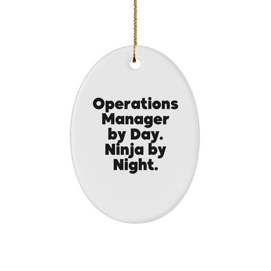 Operations Manager Gifts, Funny Oval Ornament Christmas Decorations, 'Operations Manager By Day. Ninja By Night.' from Family - Image 1