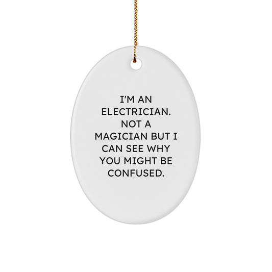 Funny Electrician Gifts for Men or Women, Oval Ornament from Friends or Family, 'I'm Not a Magician But...' - Image 1