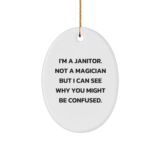 Janitor Gifts from Friends, Funny Oval Ornament for Men, 'I'm A Janitor. Not A Magician But I Can See Why You Might Be Confused.' Christmas Unique Gifts - Image 1