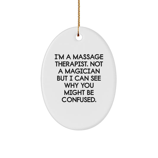 Massage Therapist Gifts from Friends, 'I'm A Massage Therapist. Not A Magician But I Can See Why You Might Be Confused.' Christmas Oval Ornament for Massage Therapist, Unique Gifts for Him or Her - Image 1