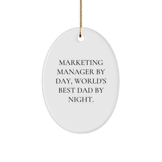 Marketing Manager Gifts, Oval Ornament with 'Marketing Manager By Day, World's Best Dad By Night.' Quote, Funny Christmas Ornament Gifts from Family to Marketing Manager - Image 1