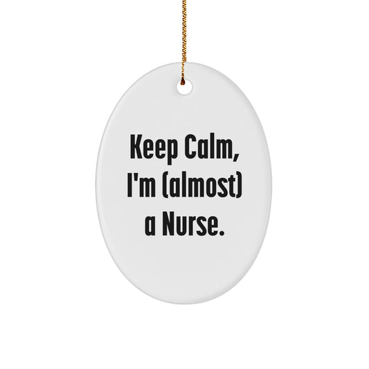 Funny Nurse Gifts, Oval Ornament, Keep Calm I'm (almost) A Nurse Christmas Unique Gifts from Friends and Family for Nurses - Image 1
