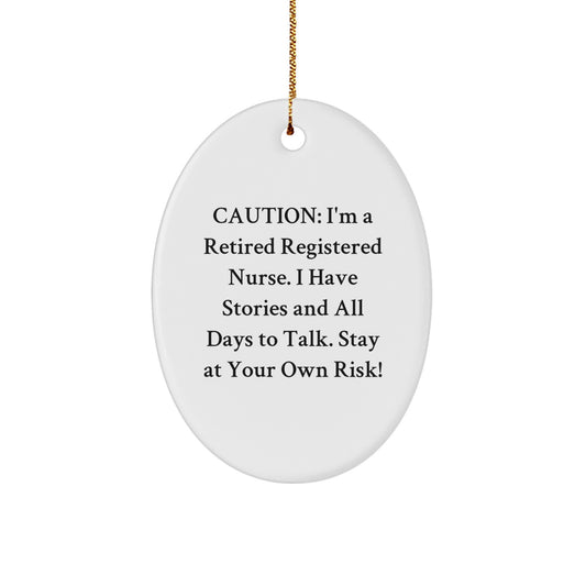 Funny Registered Nurse Gifts for Christmas - 'Caution: I'm A Retired Registered Nurse...' Oval Ornament for Her, Gifts from Family, Friends, or Coworkers - Image 1