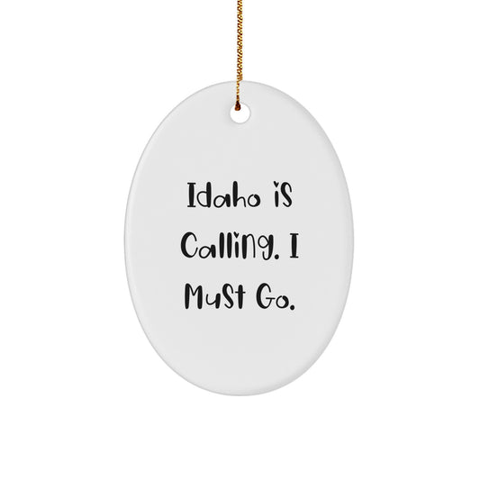 Idaho Gifts for Family and Friends - Oval Ornament with Funny Quote 'Idaho Is Calling. I Must Go.' - Perfect Christmas Unique Gift from Loved Ones - Image 1