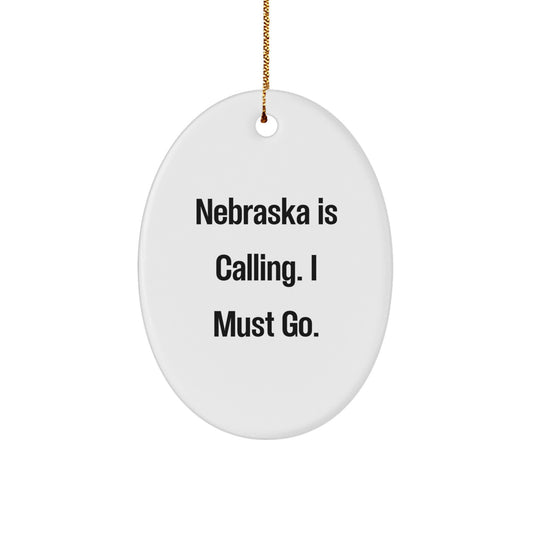 Nebraska Calling Gifts for Loved Ones - Oval Ornament with Quote 'Nebraska Is Calling. I Must Go.' - Image 1