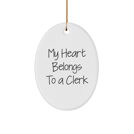 Funny Clerk Gifts - 'My Heart Belongs To A Clerk' Oval Ornament, White, Perfect for Christmas, Gifts from Friends, Coworkers, and Family - Image 1