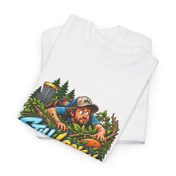 Folded white T-shirt showing "Still Looking for My Disc" disc golf graphic
