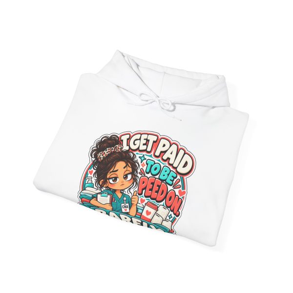 Close-up of the funny deadpan chibi CNA design on the hoodie reading "I GET PAID TO BE PEED ON. BARELY."