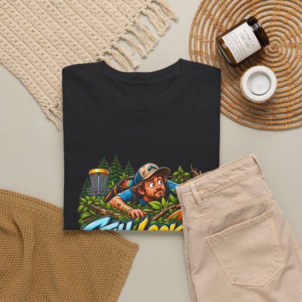 Black T-shirt with "Still Looking for My Disc" disc golf graphic, lifestyle flat-lay