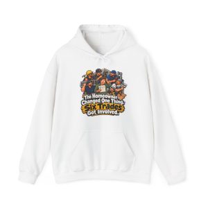 White hoodie printed on the front with a bewildered homeowner in a green hoodie holding a small change sketch while six grinning tradesmen with tools crowd around him and the words "The Homeowner Changed One Thing. Six Trades Got Involved."