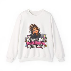 White crewneck sweatshirt printed on the front with a side-eyeing support agent in a black hoodie and headset resting her chin on her hand at a desk with a laptop covered in sticky notes, a mug of pens and a small succulent and the words "My Headset Has a Mute Button. My Face Doesn't."