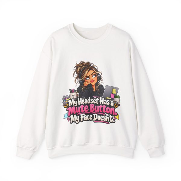 White crewneck sweatshirt printed on the front with a side-eyeing support agent in a black hoodie and headset resting her chin on her hand at a desk with a laptop covered in sticky notes, a mug of pens and a small succulent and the words "My Headset Has a Mute Button. My Face Doesn't."