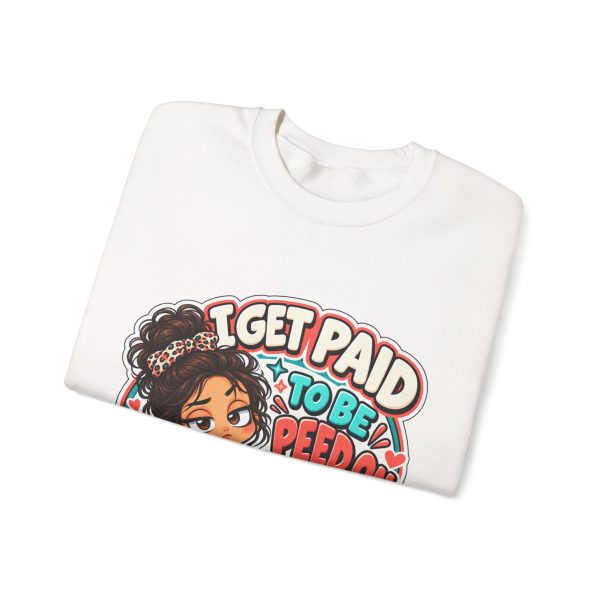 Close-up of the funny deadpan chibi CNA design on the sweatshirt reading "I GET PAID TO BE PEED ON. BARELY."