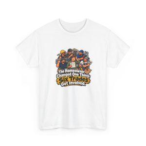 White t-shirt printed on the front with a bewildered homeowner in a green hoodie holding a small change sketch while six grinning tradesmen with tools crowd around him and the words "The Homeowner Changed One Thing. Six Trades Got Involved."