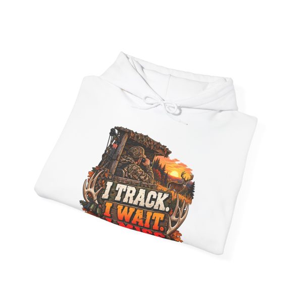 Folded white hoodie showing "I Track. I Wait. I Miss" hunting graphic