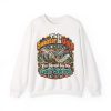 White golf crewneck sweatshirt printed with This Sweater Is Ugly. You Should See My Golf Swing and a golf club tearing a big divot through the grass