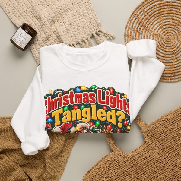 White crewneck sweatshirt with "Christmas Lights Tangled? That's Overtime" electrician Christmas graphic, lifestyle flat-lay