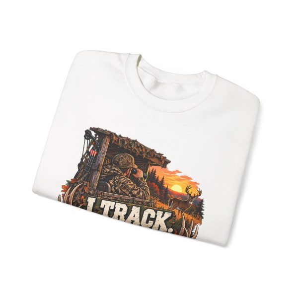White crewneck sweatshirt printed with "I Track. I Wait. I Miss." and a hunter in a wooden blind