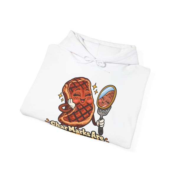 Folded white hoodie showing "Char Marks Are Flavor Freckles" BBQ graphic