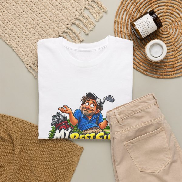 White T-shirt with "My Best Shot Is an Excuse" golf graphic, lifestyle flat-lay