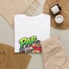 White T-shirt with "Par Is a Suggestion" golf graphic, lifestyle flat-lay