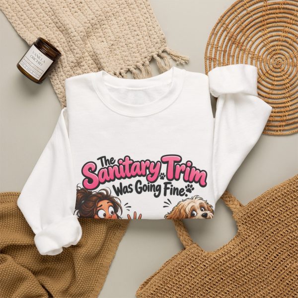 Close-up of the "The Sanitary Trim Was Going Fine. Then He Sat Down." dog groomer design on the sweatshirt