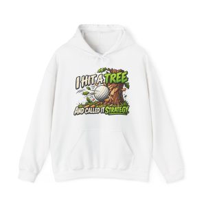 White hoodie printed with "I HIT A TREE AND CALLED IT STRATEGY." and a golf ball smashing into a tree trunk