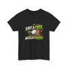 Black T-shirt with "I Hit a Tree and Called It Strategy" golf graphic, front view
