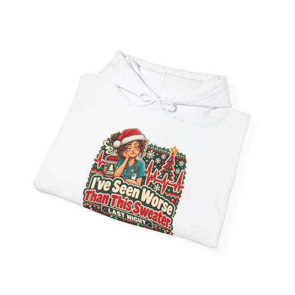 Folded white hoodie showing "I've Seen Worse Than This Sweater. Last Night." nurse Christmas graphic