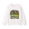 White disc golf crewneck sweatshirt printed with IN THE BUSHES FINDING MYSELF and a disc golfer in a cap peering out of dense green bushes with leaves