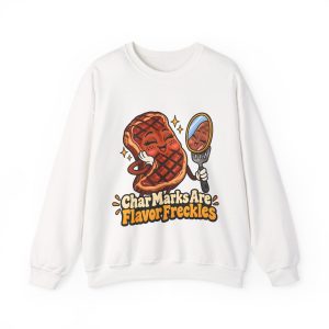 Funny BBQ crewneck sweatshirt with a blushing, freckled steak admiring its grill marks in a mirror held by a spatula
