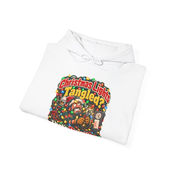 Folded white hoodie showing "Christmas Lights Tangled? That's Overtime" electrician Christmas graphic