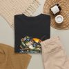 Black T-shirt with "I Fish. Therefore I Lie." fishing graphic, lifestyle flat-lay