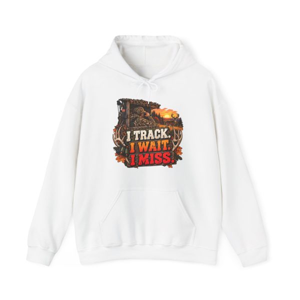 White hoodie printed with "I TRACK. I WAIT. I MISS." and a camo hunter watching through binoculars from a wooden blind