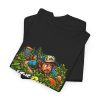Folded black T-shirt showing "In the Bushes Finding Myself" disc golf graphic