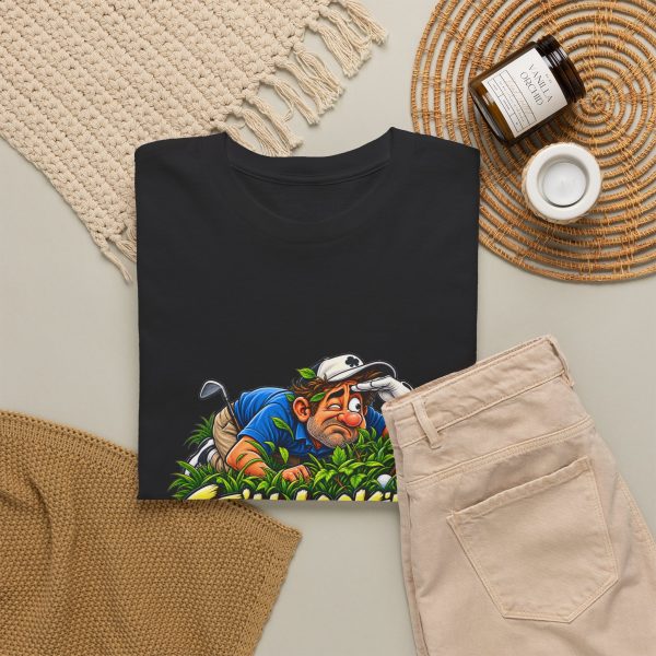 Black T-shirt with "Still Looking for That Fairway" golf graphic, lifestyle flat-lay