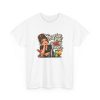 Front of the white unisex t-shirt printed with an eye-rolling bartender in a black apron leaning on the bar behind a row of cocktails and a steel shaker and the words “Surprise me” is not a flavor.