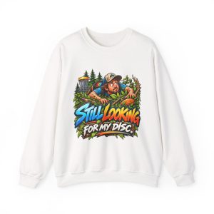 White disc golf crewneck sweatshirt printed with STILL LOOKING FOR MY DISC and a wide-eyed disc golfer crawling through thick brush and branches