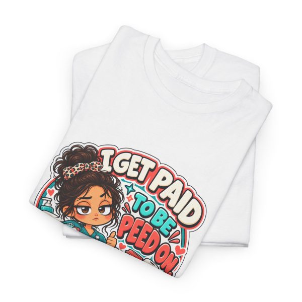 Close-up of the funny deadpan chibi CNA design on the t-shirt reading "I GET PAID TO BE PEED ON. BARELY."
