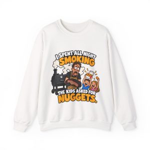White funny BBQ dad sweatshirt, a tired dad holding brisket beside a smoker while two kids cheer over a nugget box